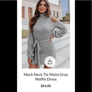 Mini sweater dress with open shoulders